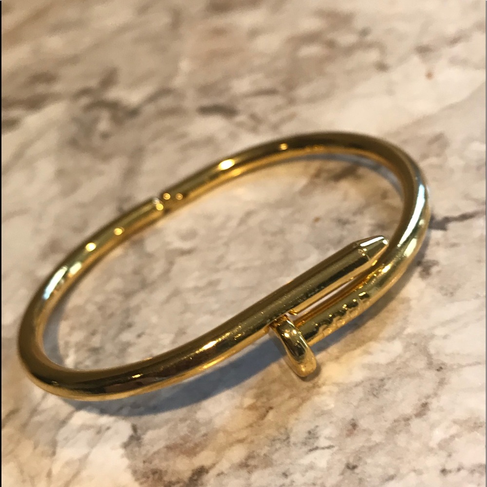 Gold nail bracelet